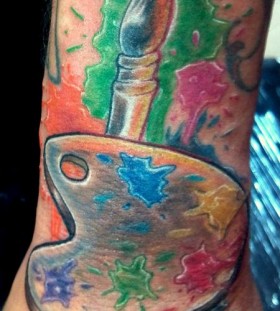 Paint brush and colours tattoo