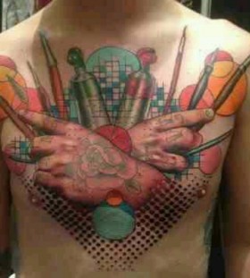 Paint brush chest tattoo