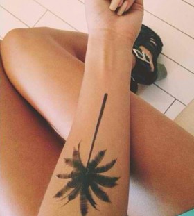 Palm tree arm tattoo