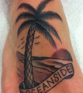 Palm tree foot tattoo