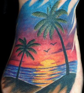 Palm trees and sunset tattoo