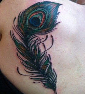 Peacock feather tattoo by Flo Nuttall