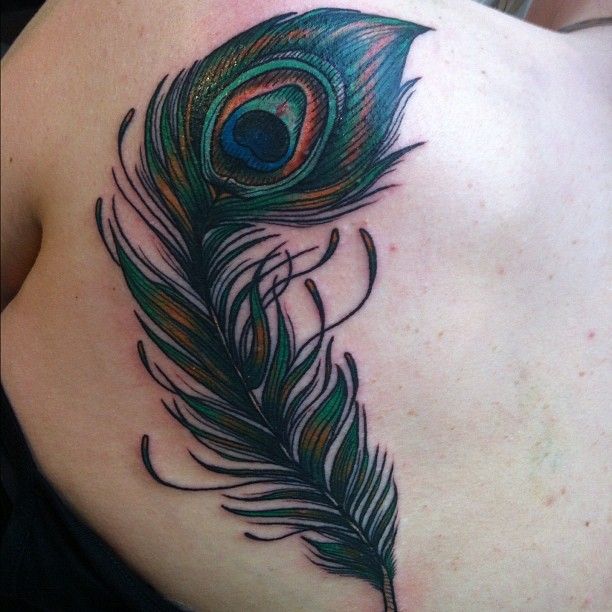 Peacock feather tattoo by Flo Nuttall