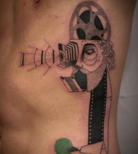 Photographer tattoo by Expanded Eye