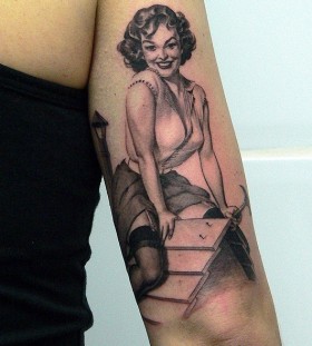 Pin up girl tattoo by Xavier Garcia Boix