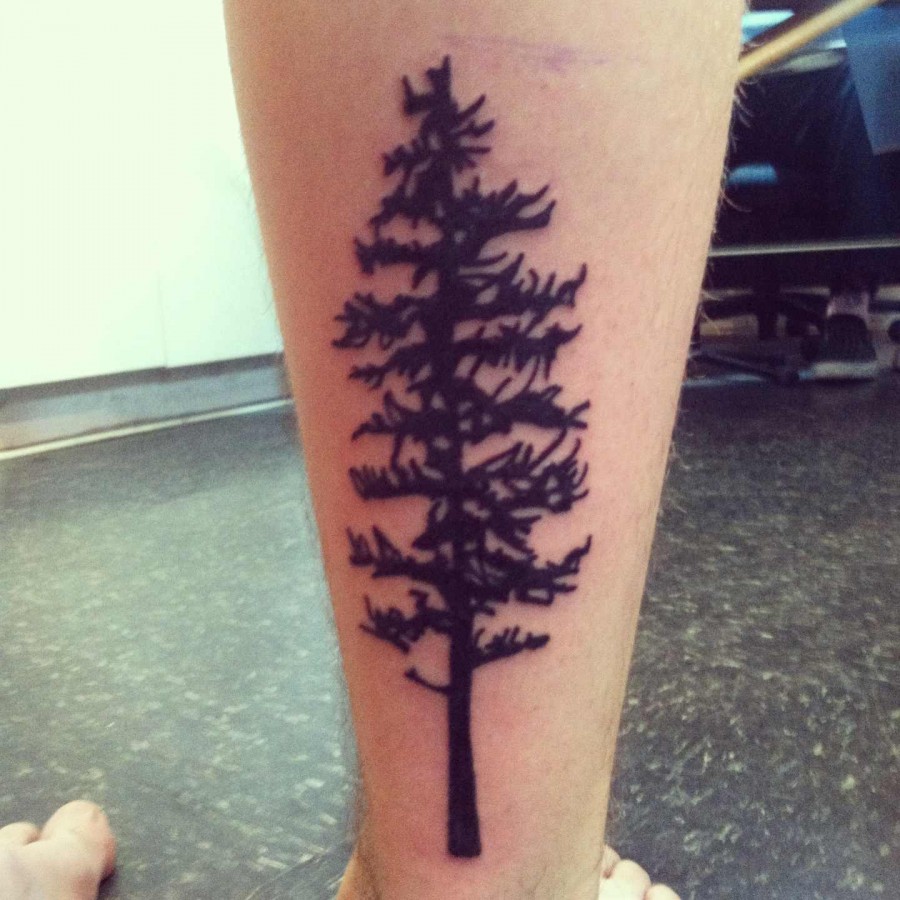 Pine tree arm tattoo