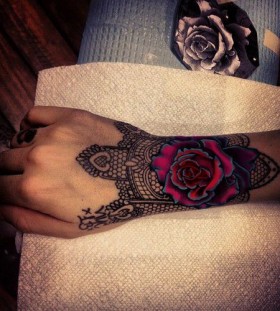 Pink bright flower rose and black lace tattoo