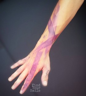 pink-brushstroke-watercolor-tattoo