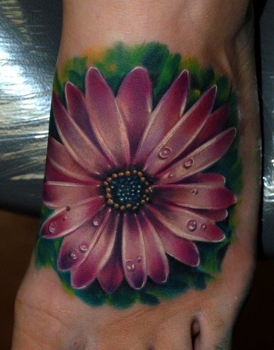 Pink flower tattoo by Kyle Cotterman