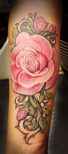 Pink rose tattoo by Jessica Brennan