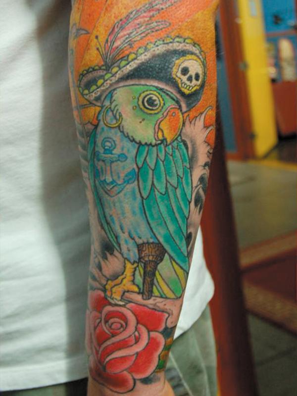 Pirate parrot arm tattoo