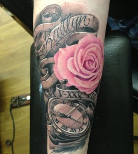 Pocket watch and pink rose tattoo