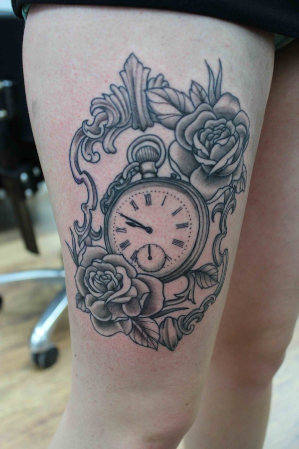 Pocket watch and roses leg tattoo