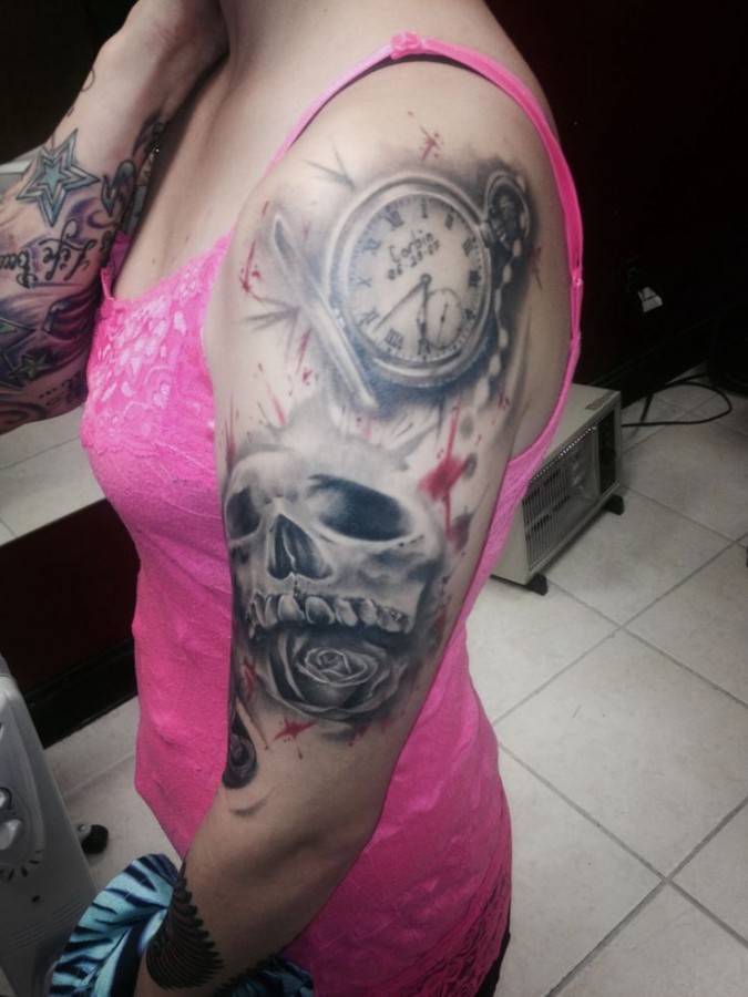 Pocket watch and skull tattoo