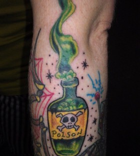 Poison bottle arm tattoo