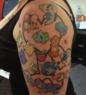 Pokemon characters arm tattoo