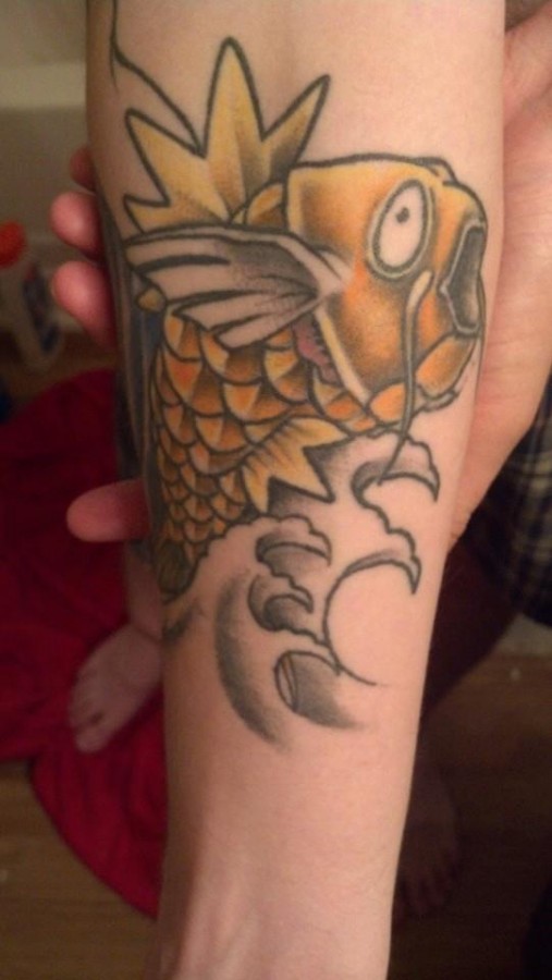 Pokemon magikarp arm tattoo