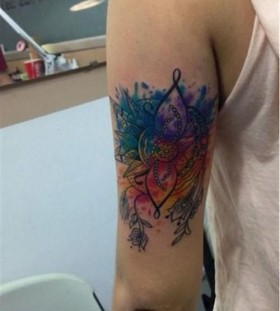 Pretty arms' watercolor tattoo