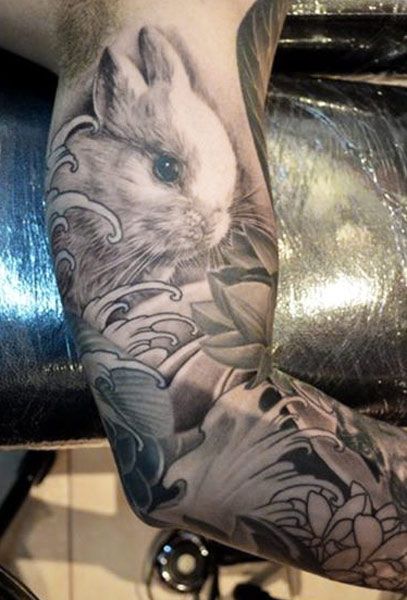 Pretty bunny tattoo by Elvin Yong
