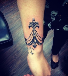 Pretty chandelier arm tattoo