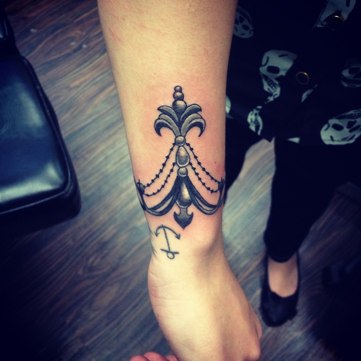 Pretty chandelier arm tattoo