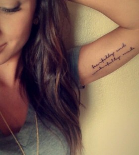 Pretty girl's arm tattoo