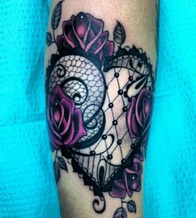 Purple and black lace tattoo