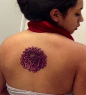 Purple dahlia back tattoo