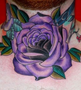 Purple rose tattoo by Eva Huber