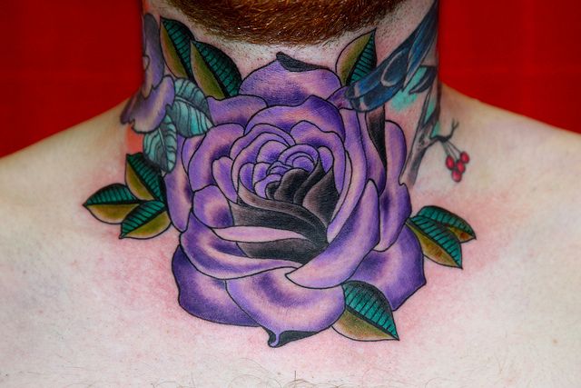 Purple rose tattoo by Eva Huber