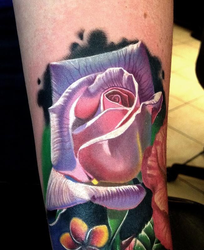 Purple rose tattoo by Phil Garcia
