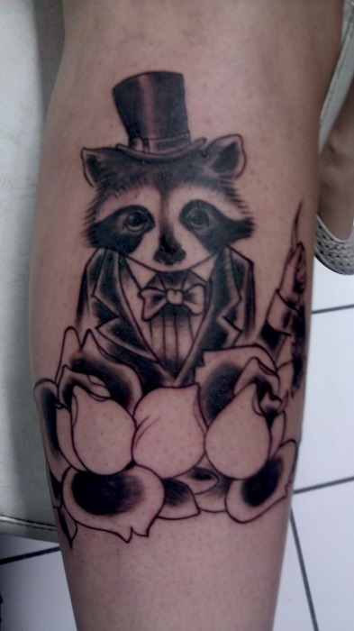 Raccoon with a suit tattoo