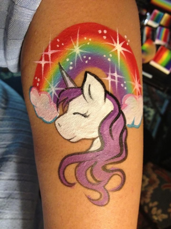 Rainbow and lovely unicorn tattoo