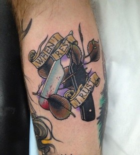 Razor and writing tattoo by Dan Molloy