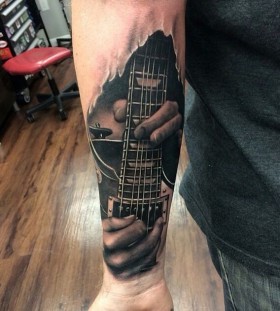 Realistic guitar tattoo by Kyle Cotterman