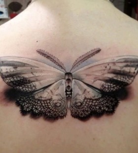Realistic moth back tattoo