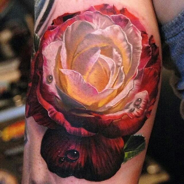 Realistic rose tattoo by Phil Garcia