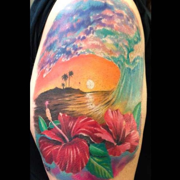 Realistic sunset and flowers tattoo