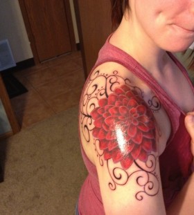 Red dahlia shoulder tattoo