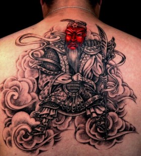 Red face samurai back tattoo