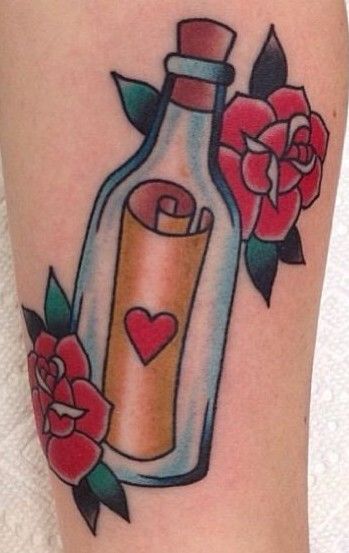 Red heart and letter bottle tattoo