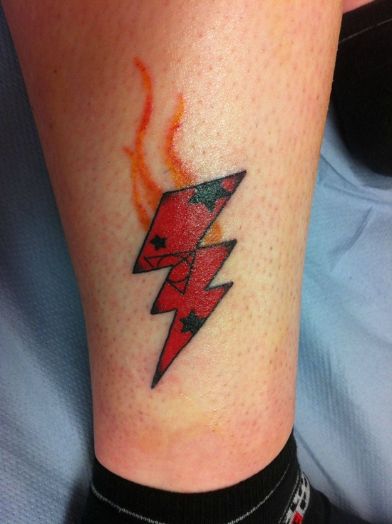Red lightning bolt tattoo