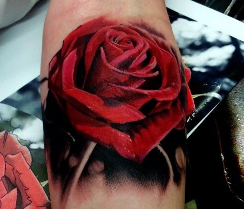 Red rose tattoo by Kyle Cotterman