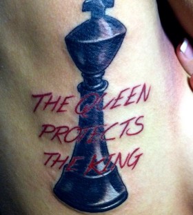 Red words and chess tattoo