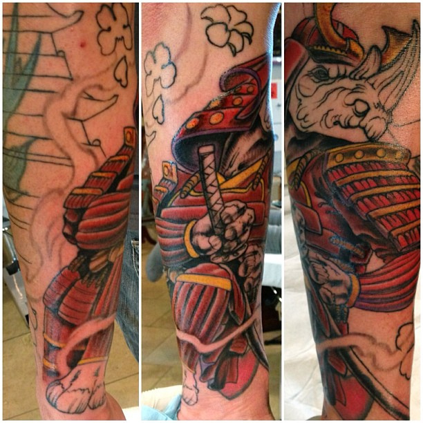Rhino samurai arm tattoo