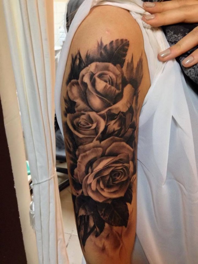 Roses arm tattoo by Razvan Popescu