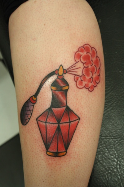 Ruby red perfume bottle tattoo