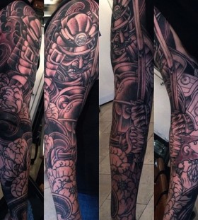 Samurai with sword full arm tattoo