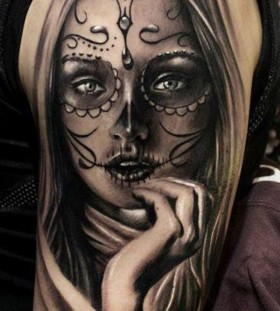 Santa muerte girl tattoo on shoulder