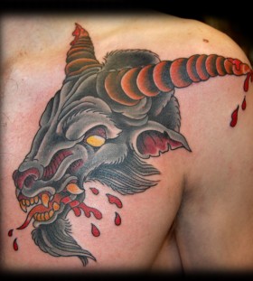 Scary goat tattoo